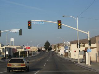 Westbound Business Loop I-15 and Historic U.S. 66 (Main Street) meet Seventh Avenue at this signalized intersection.