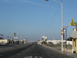 The Historic U.S. 66 sign along Main Street west at Avenue E was removed by 2021.