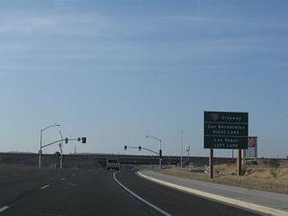 Southbound Business Loop I-15 continues 0.4 miles south along L Street to a diamond interchange (Exit 181) with Interstate 15 north to Las Vegas and south to Victorville and San Bernardino.