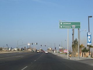 The overhead preceding the turn of Business Loop I-15 south onto L Street was removed after 2023. Historic U.S. 66-91 remain along Main Street south to the community of Lenwood en route to  Oro Grande and Interstate 15 in Victorville.