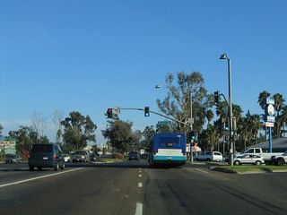 Mission Avenue (San Diego County Route S-14) intersects Business Loop I-15 just south of the exchange with SR 78. The signed county route follows the old alignment of SR 78 west toward San Marcos, Vista and Oceanside.