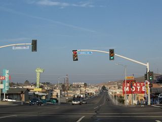B Street appears along the western horizon beyond the signalized intersection joining Main Streetand Muriel Drive.