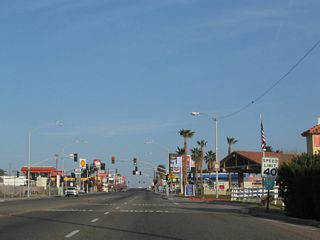 A replacement of the speed limit sign made by 2012 along E Main Street north of Roberta Street did not include a new Business Loop I-15 shield.