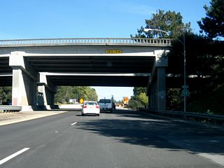 Still within the California 1 interchange, the first California 17 reassurance shield is posted prior to the trumpet interchange between California 1 south and California 17 north. Upon passing under this bridge, California 17 leaves the city of Santa Cruz and enters unincorporated Santa Cruz County.