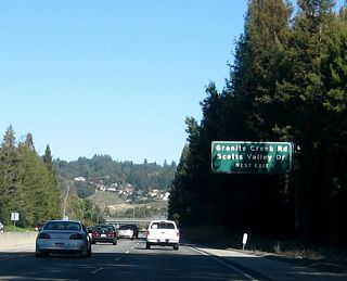 This guide sign advises of the next exit along California 17 north, which is Exit 5, California 17 Business/Scotts Valley Drive south and Granite Creek Road.