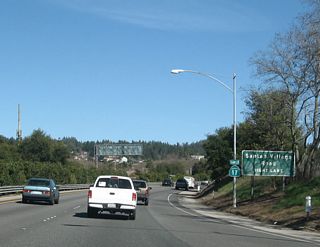 The final exit on this stretch of California 17 freeway is Exit 6, Santa's Village Road. Santa's Village Road is named that because many decades ago (circa 1950s), there was a small, Christmas-themed amusement park there, where the headquarters of computer company Borland now stands.