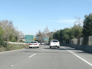 After the Santa Cruz Avenue off-ramp, signage immediately appears on California 17 north for Monte Sereno and West Valley College via Exit 20B (loop ramp to California 9/Saratoga Avenue west).