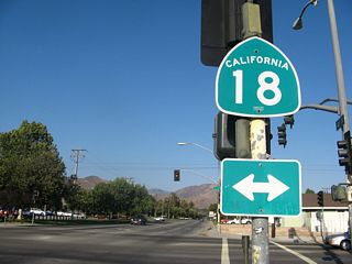 This California 18 trailblazer is located in San Bernardino along eastbound 40th Street at Waterman Avenue.