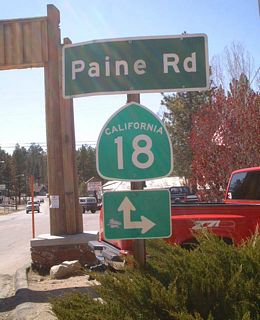 End Westbound California 18 Business in the city of Big Bear Lake. Heading straight ahead connects to Westbound (Southbound) California 18, and turning right on Paine Road leads to Eastbound/Northbound California 18.