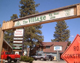 Begin eastbound California 18 Business in the city of Big Bear Lake. This overhead arch includes a unique wooden California 18 Business shield.