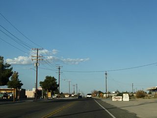 A two-lane connector road links California 18 and California 247 via Old Woman Springs Road in Lucerne Valley. This view looks east along Old Woman Springs Road between California 18 and California 247 in Lucerne Valley.