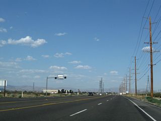California 18 sees a four-lane segment east of U.S. 395.