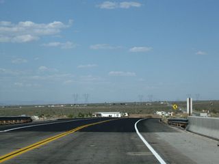 California 18 crosses over a railroad just before reaching the Los Angeles-San Bernardino County Line.