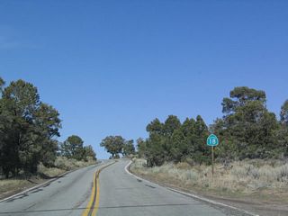 Now leaving the vicinity of Baldwin Lake, California 18 will ascend  to a summit, then wind down toward the Mojave Desert.