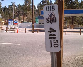 Westbound California 18 along Paine Road at Milepost 48, at California 18 Business eastbound in Big Bear Lake.