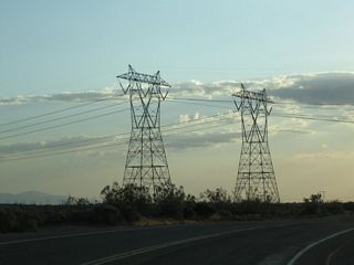 California 18 passes under a branch of electrical transmission Path 46 (West of Colorado River), which includes these two 500kV power transmission lines owned by Southern California Edison. These lines link power generating stations located along the Colorado River with the Lugo substation in Hesperia southwest of here. These lines then proceed west, staying north of the San Gabriel Mountains, heading en route to the Vincent Substation near Palmdale.