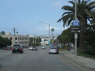 Westbound Second Street meets Appian Way at this connecting ramp. The guide sign for Appian Way is one of the few remaining porcelain-enamel, black guide signs in the Southland.