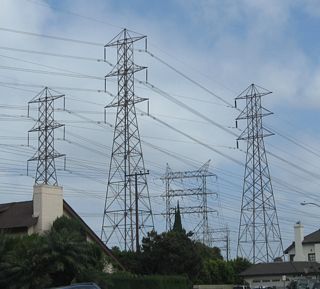 A large power plant sits south of California 22 (Seventh Street) and east of Studebaker Road in Long Beach. Southern California Edison and Los Angeles Department of Water and Power electric transmission lines converge on this power plant, including these lines visible from a neighborhood just north of California 22.