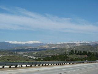Snow-capped peaks come into view along California 23.