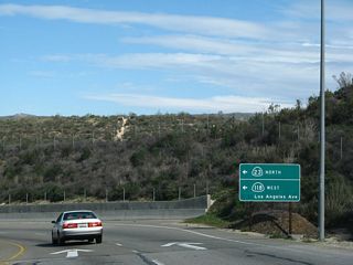 California 23 turns west from the freeway off-ramp to join Los Angeles Avenue en route to Fillmore.