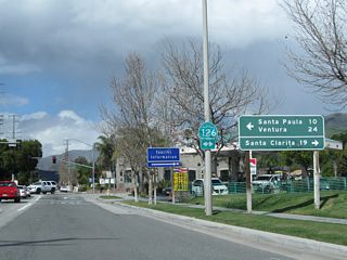In the next block, California 23 (A Street) north approaches California 126 (Ventura Street). California 126 travels east to Santa Clarita  or west to Santa Paula and Ventura. This busy state highway has at least four lanes through Fillmore.
