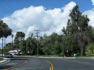California 23 gains a center turn lane the roadway shifts toward the northwest. The road changes from Moorpark Avenue into Walnut Canyon Road.