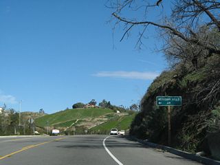 Meridian Hills Drive connects California 23 passes with a newer residential development on the west side of the state route. A new traffic signal governs the flow of traffic at Spring Road, which travels south to reconnect with California 23-118/Los Angeles Avenue just west of the Moorpark Freeway / Simi Valley Freeway interchange. Championship Drive connects to Moorpark Country Club, which includes a residential community adjacent to the golf course.