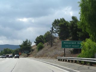 Exit 13 connects to Hillcrest Drive, Thousand Oaks Boulevard and Civic Arts Plaza. Upon exiting, the off-ramp becomes a frontage road with the first intersection at Hillcrest Drive and the second intersection with Thousand Oaks Boulevard.