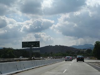 This mileage sign provides the distance for the next four exits on California 23 (Moorpark Freeway) south: Exit 14, Janss Road; Exit 13, Hillcrest Drive and Thousand Oaks Boulevard; and Exits 12B-A, U.S. 101 (Ventura Freeway).