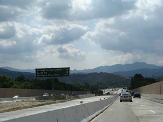 This mileage sign provides the distance for the next three exits on California 23 (Moorpark Freeway) south: Exit 15, Avenida de los Arboles; Exit 14, Janss Road; and Exit 13, Hillcrest Drive and Thousand Oaks Boulevard.