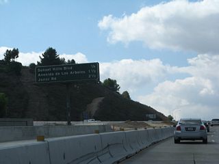 This mileage sign provides the distance for the next three exits on California 23 (Moorpark Freeway) south: Exit 16, Sunset Hills Boulevard; Exit 15, Avenida de los Arboles; and Exit 14, Janss Road.