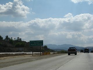 Between California 118 and U.S. 101, California 23 is known both as the Moorpark Freeway and as the Military Intelligence Service Memorial Highway. This sign is posted in the median just after the on-ramp from Los Angeles Avenue.