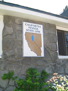 A sign depicts the location of the state line of California-Nevada as it passes through the lodge. This sign is found to the right of the main entrance.