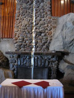 The state line of California-Nevada passes directly through the Indian Room, a large dining room/conference center on the west side of the Cal-Neva Lodge. A gold stripe represents the California side of the state line, while a silver stripe denotes the Nevada side. The state line runs right through the chimney.
