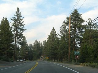 Shortly thereafter, eastbound California 28 approaches Fabian Way north into another residential area.