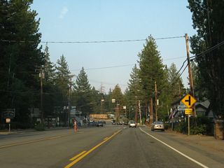 Eastbound California 28 approaches National Avenue north in Tahoe Vista.
