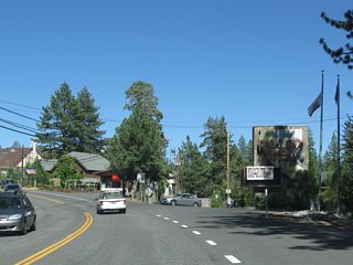 Eastbound California 28 (North Tahoe Boulevard) meets Cal Neva Drive to the Cal Neva Lodge and Casino. This gaming facility is unique in that the state line between Nevada and California runs through its swimming pool and main dining room (see below for photos). Photos taken 07/21/09 and 07/08/07.