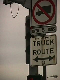 Further north but still in Orange County, this old truck route sign was placed by the Automobile Club of Southern California (ACSC, a branch of the national American Automobile Association/AAA). In the early days of California roads, many regulatory and guide signs were placed by the ACSC rather than the state. This sign is one of few remaining ACSC sign still in use along California 39 in La Habra.