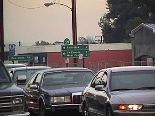 This view shows California 39 (Whittier Boulevard) north prior to the break in its route. Through traffic may take either Hacienda Road north into La Habra Heights or Harbor Boulevard north into Rowland Heights. Los Angeles County N-8 (La Mirada Boulevard and Colima Road) also provides a good alternate route to cover the gap between the north and south segments of California 39.
