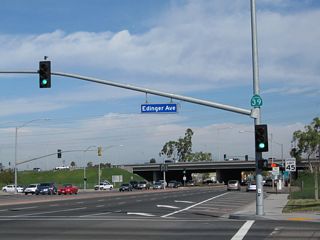 Another California 39 reassurance shield is posted on the traffic signal mast arm at the intersection between Beach Boulevard and Edinger Avenue.