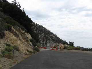 The first four miles of California 39, between the junction with California 2 at Islip Saddle and a point near Crystal Lake and Falling Springs, have been closed since in 1978 due to rockslides. This barricade blocks vehicular entry onto California 39.
