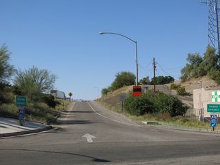 The freeway entrance signs on J Street in Needles omit the overlap with U.S. 95. U.S. 95 combines with I-40 north to Exit 141 and southeast to Exit 144.