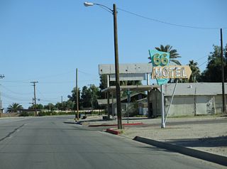 A vintage 66 Motel sign at Broadway Street and Desnok Street.