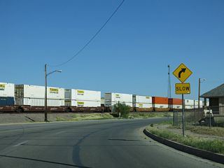 Broadway Street overtakes Front Street beside the BNSF Needles Rail Yard.