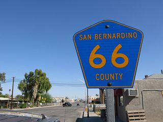 The confirming marker for County Route 66 east after J Street was removed after 2018.