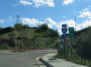 Trailblazers for Business Loop I-40 and I-40 were posted where Broadway Street shifts east away from the adjacent freeway at L Street.