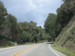 Turning north, SR 41 (E.G. Lewis Highway) continues along Morro Creek to the east of Dark Range Peak.