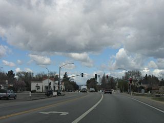 Eastbound California 41 (E.G. Lewis Highway) approaches Portola Road.