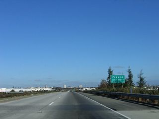 California 41 (Yosemite Freeway) enters the city of Fresno in the heart of the San Joaquin Valley. Home to 427,652 people as of the 2000 Census, Fresno has seen significant growth to where 2009 population estimates are over one-half million (500,000 people). The city has seen substantial development around the city and is the seat of largely agricultural Fresno County. It was founded on October 12, 1885. Fresno sits at an elevation of 294 feet and lies along the Historic U.S. 99 corridor. It is the largest city in California (and the United States) not to be served by an Interstate Highway, but it is served by three major freeways: California 41 (north-south), California 99 (northwest-southeast), and California 180 (east-west). A fourth north-south freeway (California 168) offers relief to California 41.