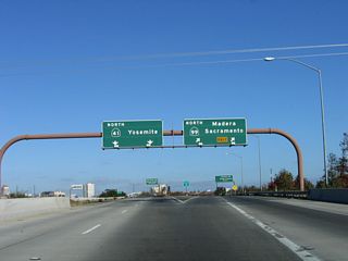 Northbound California 41 meets Exit 126A, California 99 (Golden State Freeway) north. California 99 is a major north-south freeway that serves most of the cities through the Central Valley, from Bakersfield to Fresno to Modesto to Stockton to Sacramento to Chico to Red Bluff. Replacing Historic U.S. 99, California 99 is almost entirely freeway between Bakersfield and Sacramento. Projects underway converted the rest of California 99 into full freeway standards with interchanges.